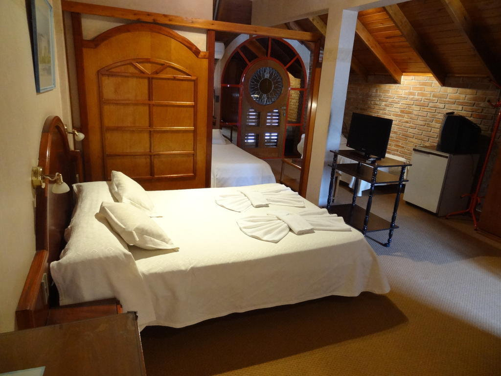 Mon Petit Hotel Villa Carlos Paz Habitación foto